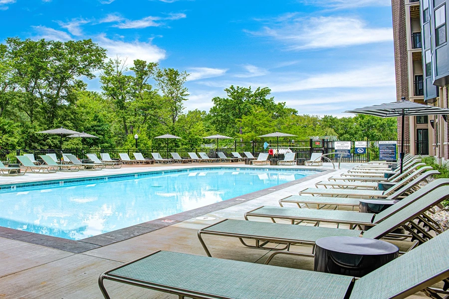 Write down any questions you think of while touring model apartments like this one at East Bank Apartments. View of East Bank's luxury pool